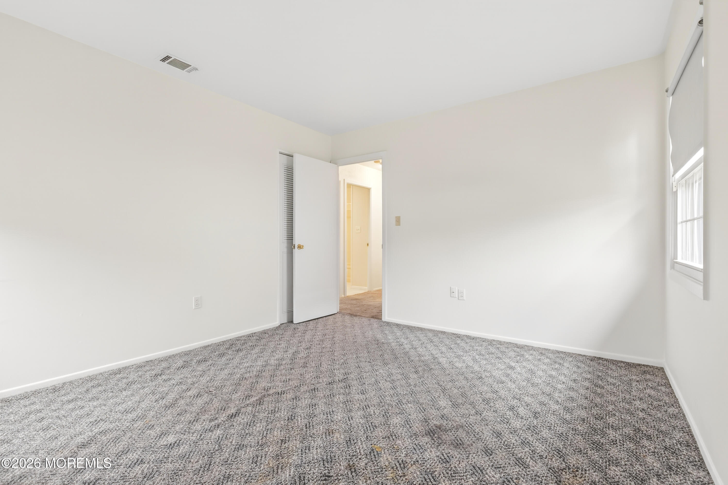 120 Andover Lane Matawan, NJ 07747 - Photo 30 of 35 an empty room with windows and closet