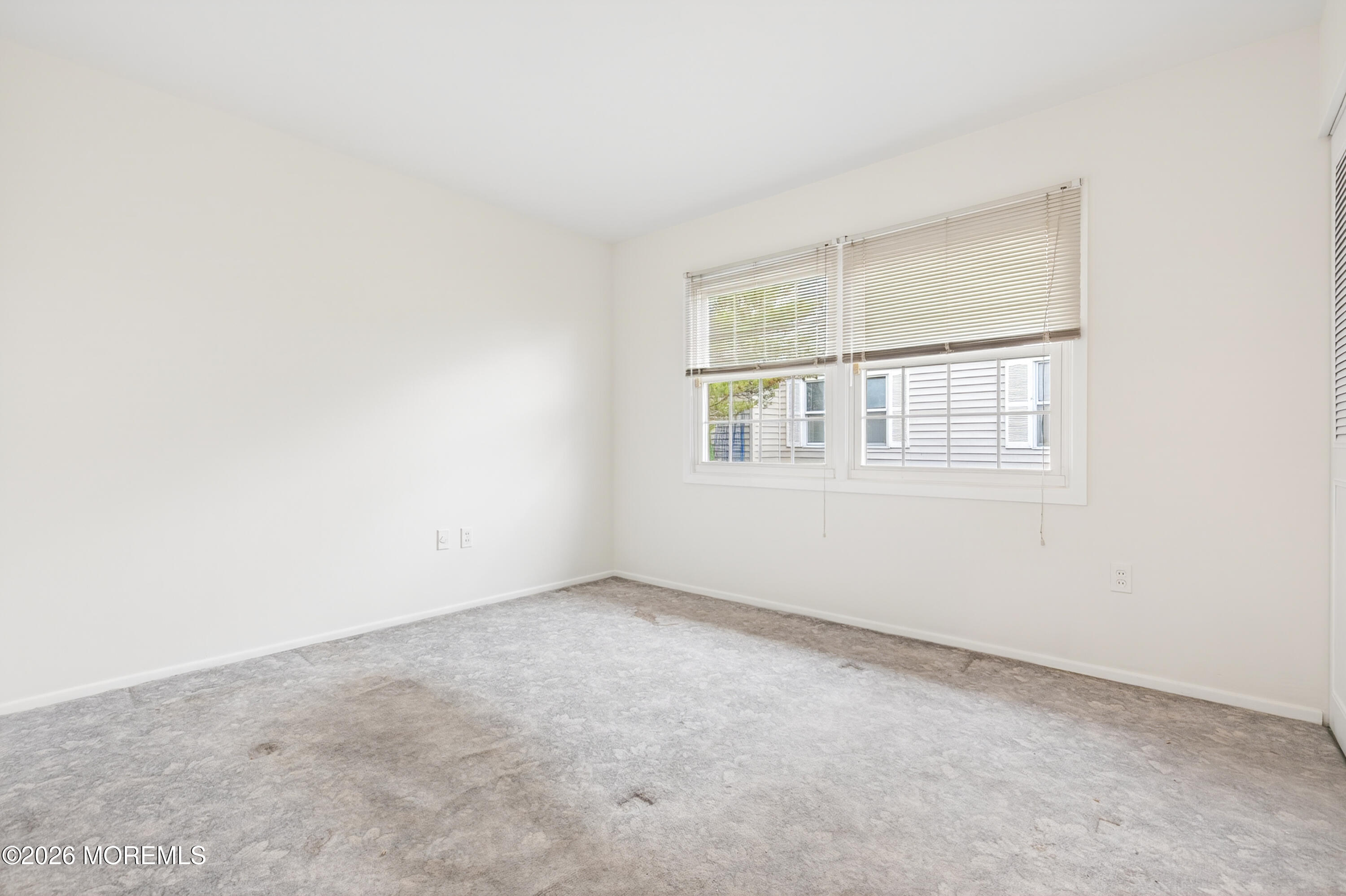 120 Andover Lane Matawan, NJ 07747 - Photo 31 of 35 an empty room with a window
