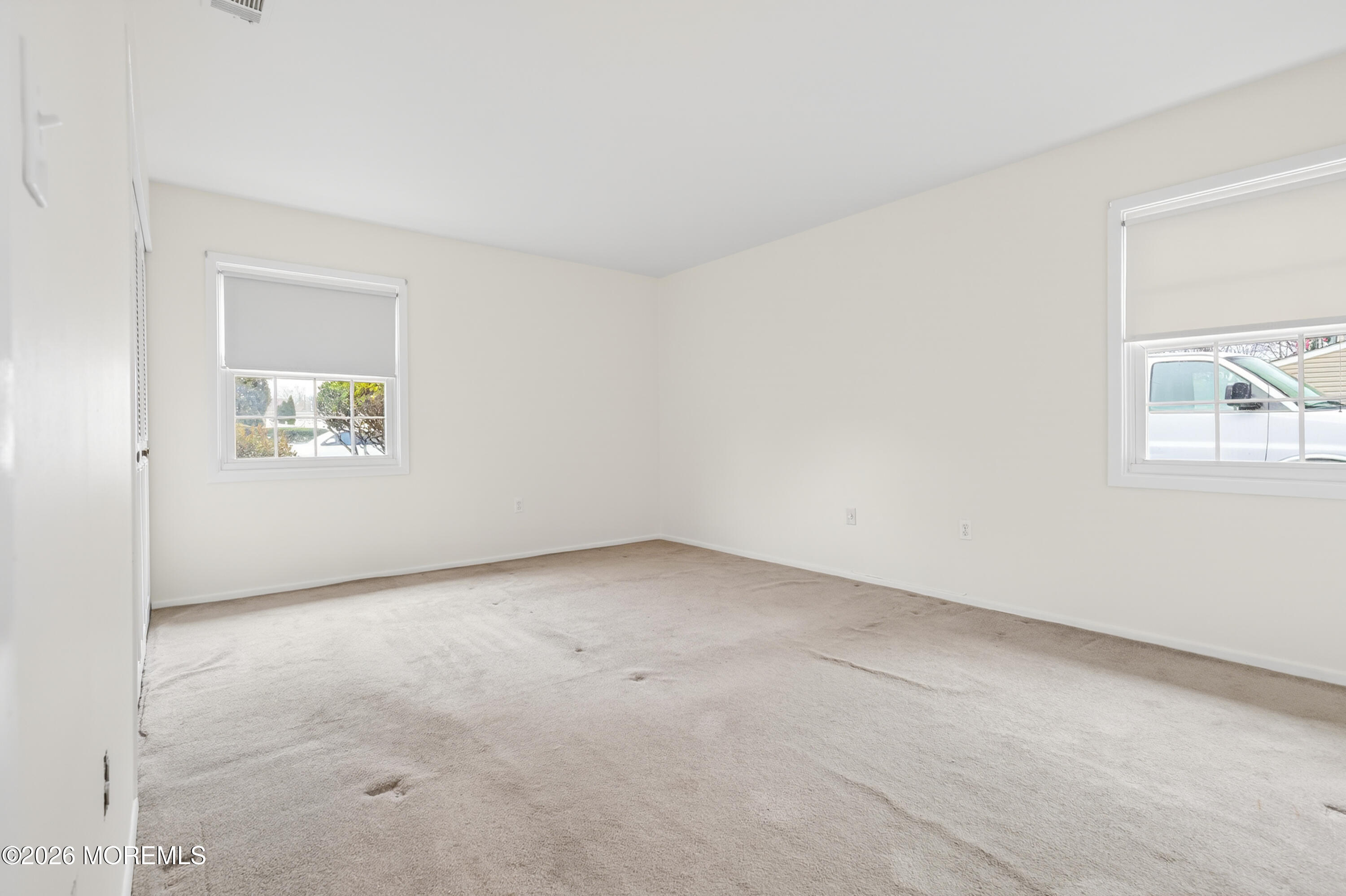 120 Andover Lane Matawan, NJ 07747 - Photo 35 of 35 an empty room with windows
