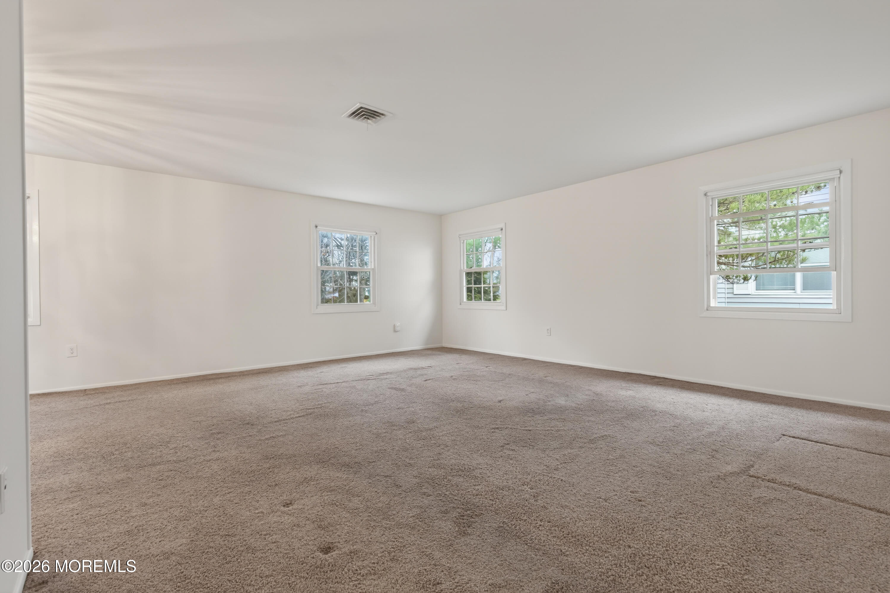 120 Andover Lane Matawan, NJ 07747 - Photo 8 of 35 an empty room with windows