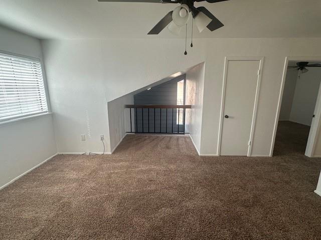 5626 Preston Oaks Road, Unit 5D Dallas, TX 75254 - Photo 16 of 29 a view of a livingroom with a ceiling fan and window