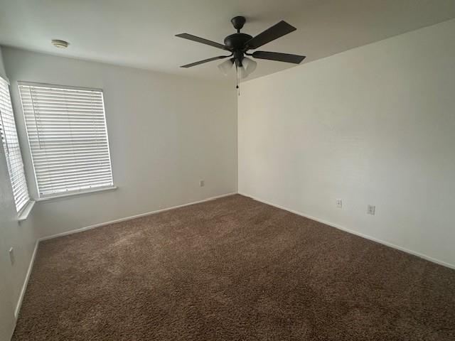 5626 Preston Oaks Road, Unit 5D Dallas, TX 75254 - Photo 17 of 29 an empty room with a window and a fan