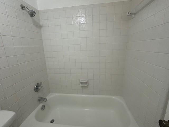 5626 Preston Oaks Road, Unit 5D Dallas, TX 75254 - Photo 19 of 29 a bathroom with a bathtub