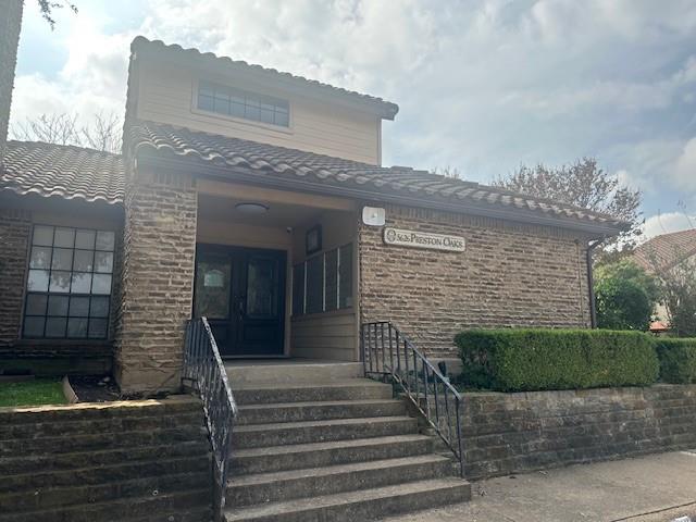 5626 Preston Oaks Road, Unit 5D Dallas, TX 75254 - Photo 27 of 29 a front view of a house