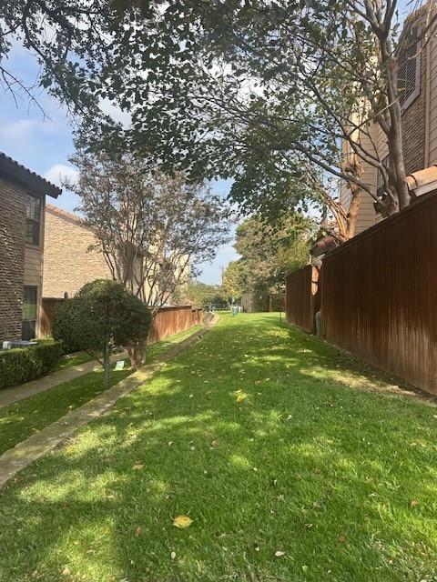 5626 Preston Oaks Road, Unit 5D Dallas, TX 75254 - Photo 29 of 29 a view of backyard with green space