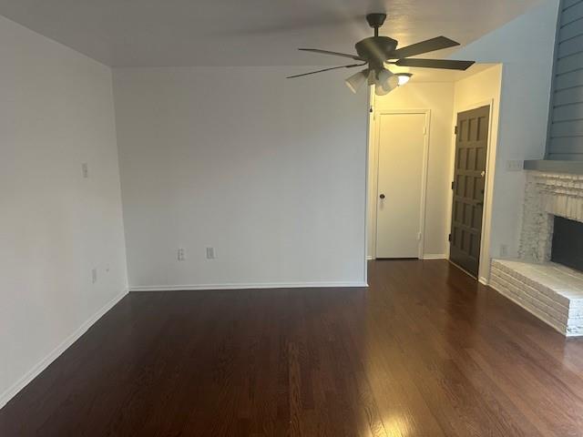 5626 Preston Oaks Road, Unit 5D Dallas, TX 75254 - Photo 7 of 29 a view of a small space with wooden floor and a ceiling fan