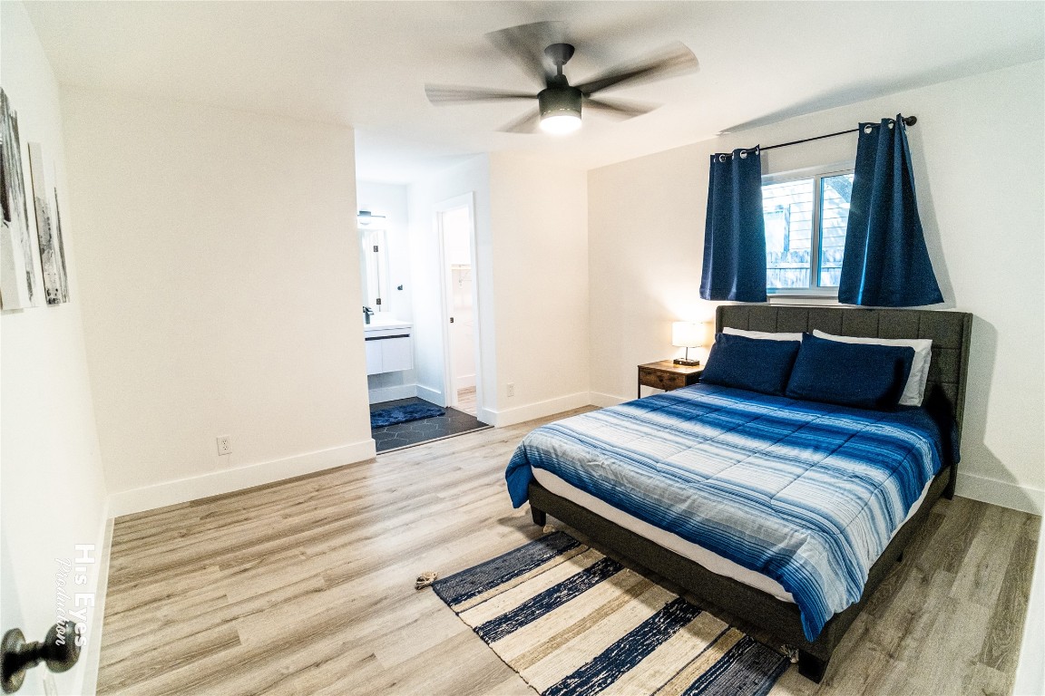 7500 Rio Pass Austin, TX 78724 - Photo 14 of 38 a bedroom with bed and window