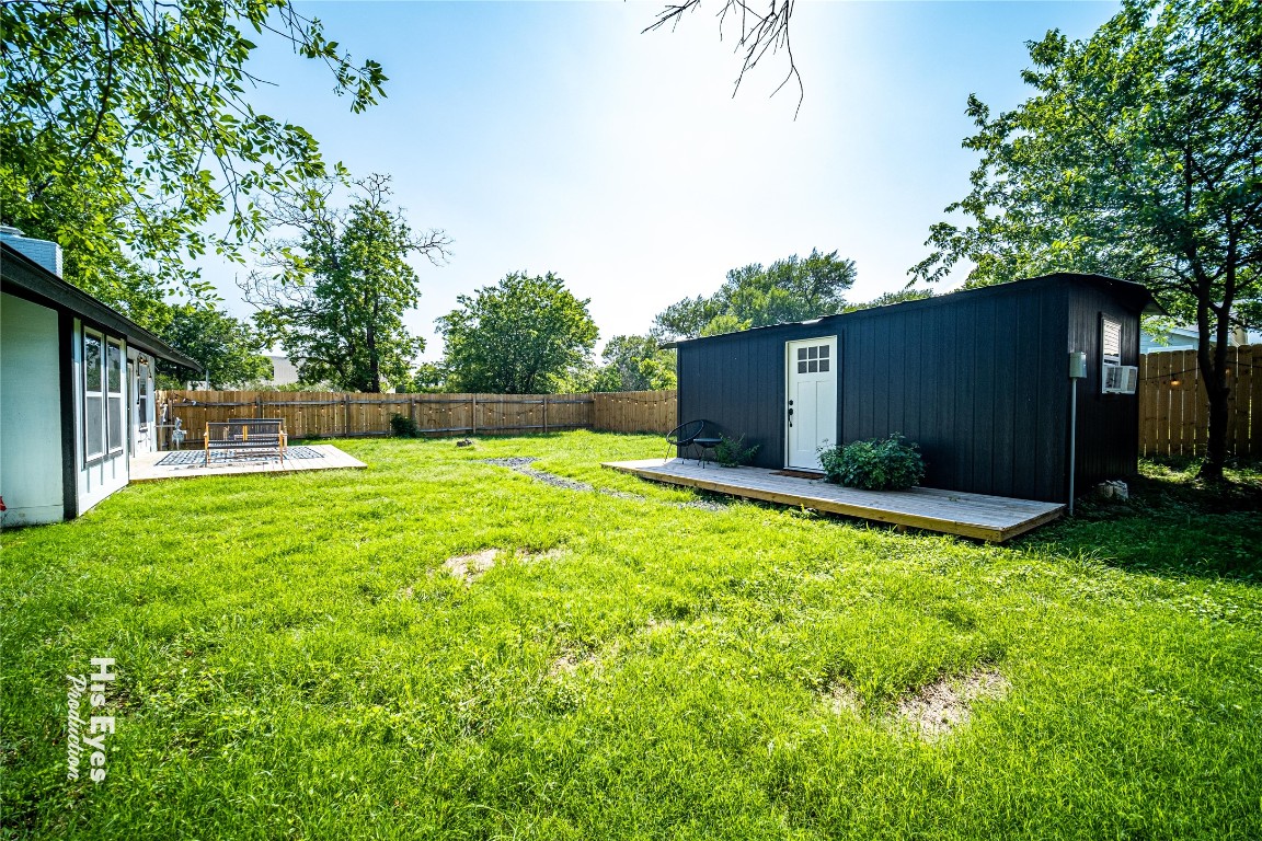 7500 Rio Pass Austin, TX 78724 - Photo 31 of 38 a backyard of a house with lots of green space