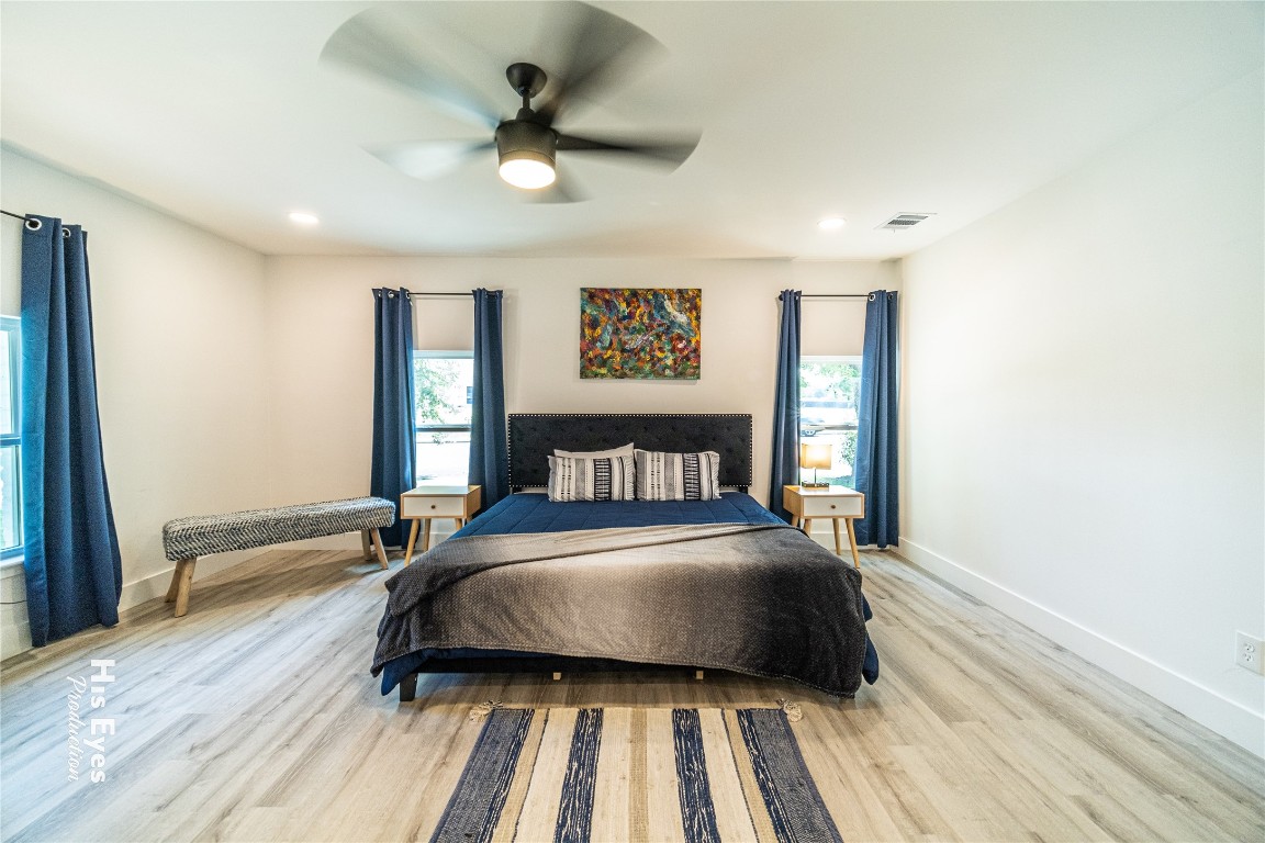 7500 Rio Pass Austin, TX 78724 - Photo 38 of 38 a bedroom with a bed and a ceiling fan