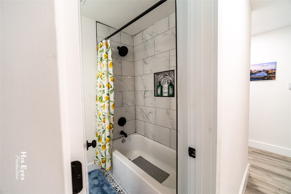 7500 Rio Pass Austin, TX 78724 - Photo 10 of 38 a bathroom with a tub and shower