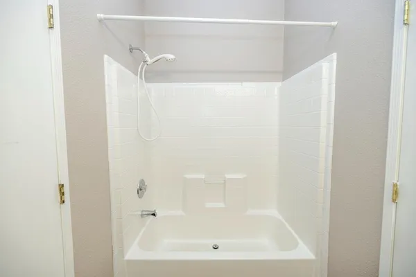 a bathroom with a bathtub