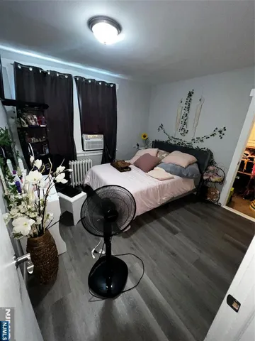 a view of a house with backyard and deck