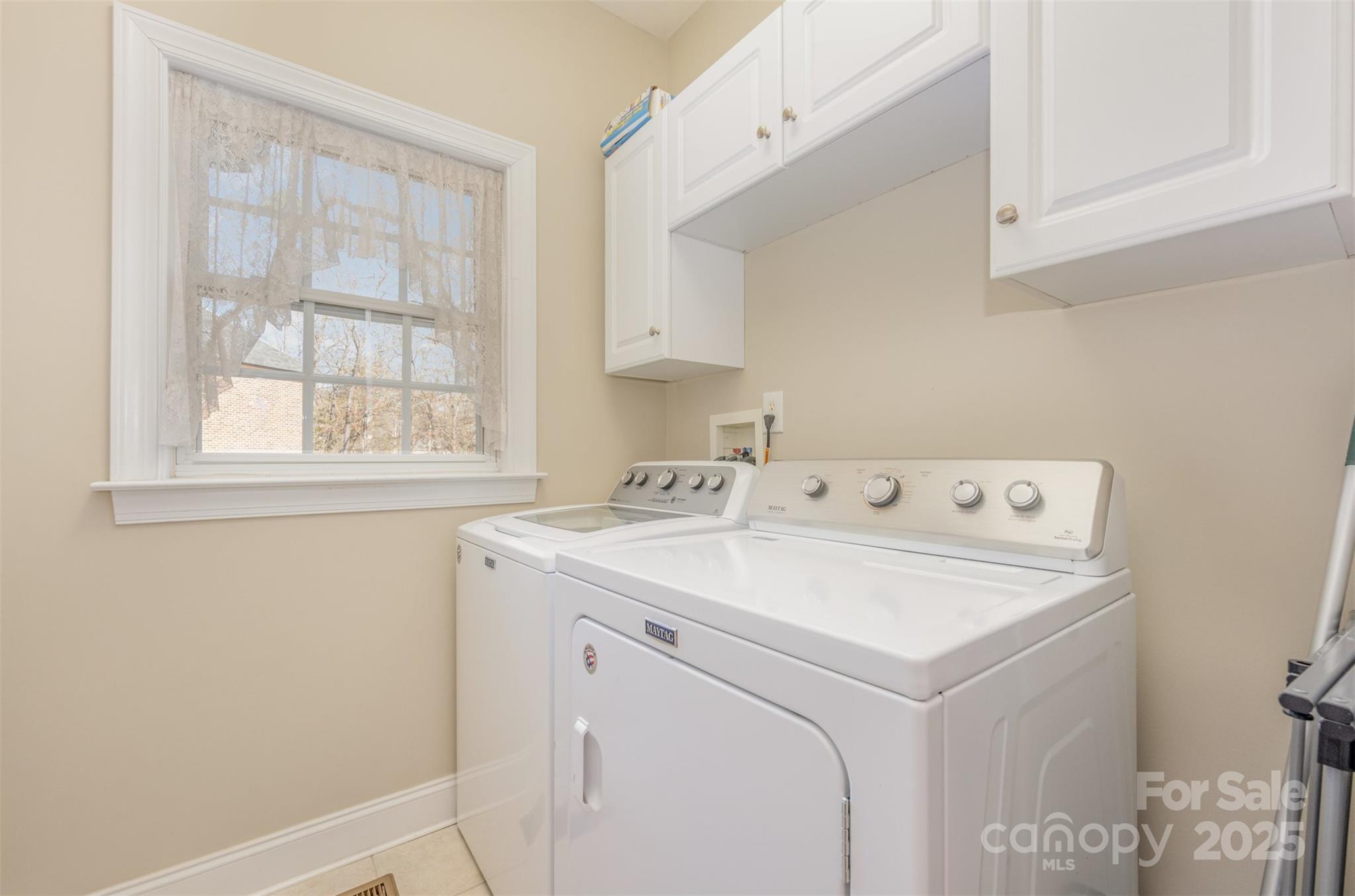 9467 Hester Court Harrisburg, NC 28075 - Photo 17 of 48 a utility room with dryer and washer