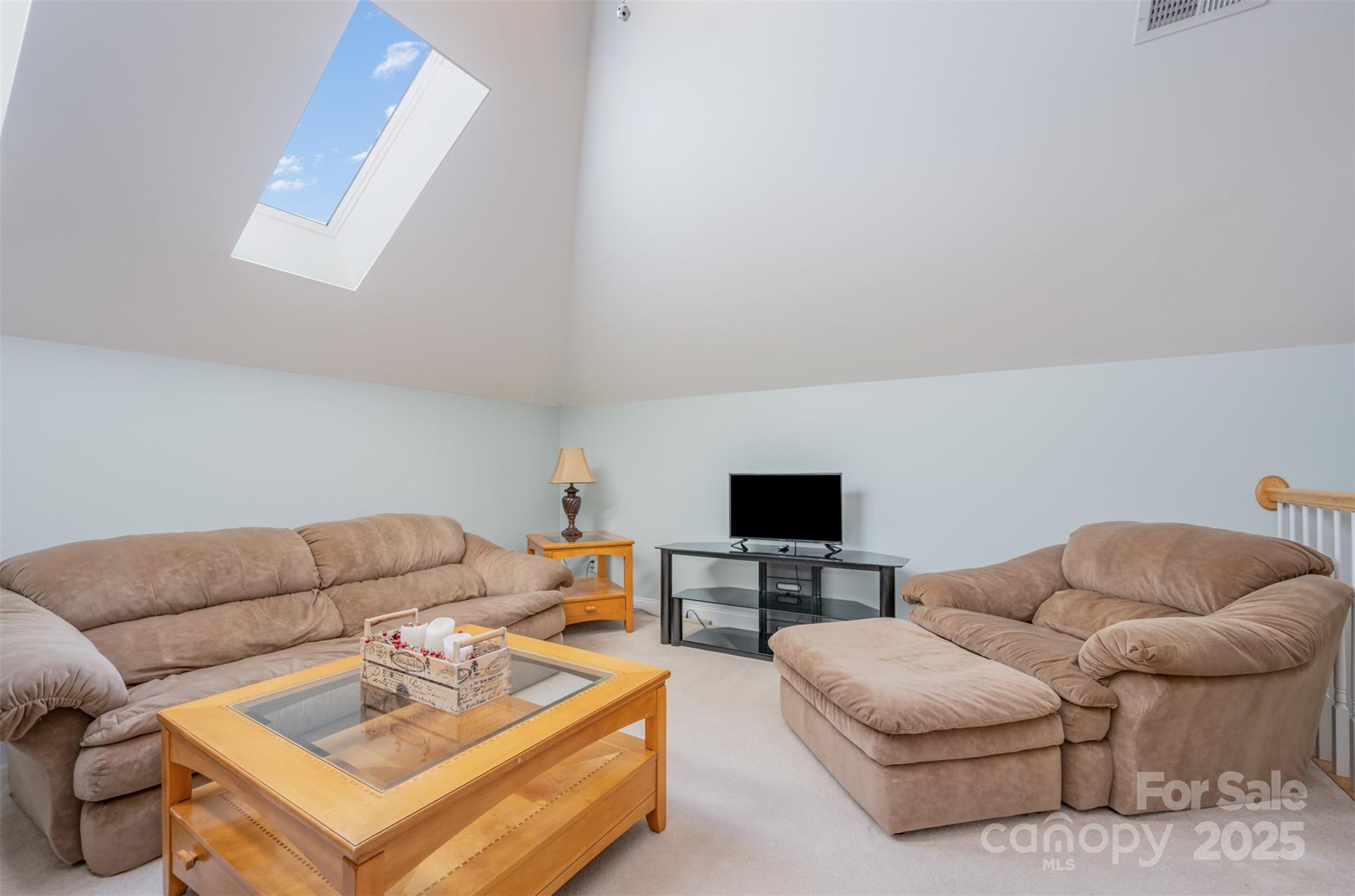 9467 Hester Court Harrisburg, NC 28075 - Photo 29 of 48 a living room with furniture and a couch