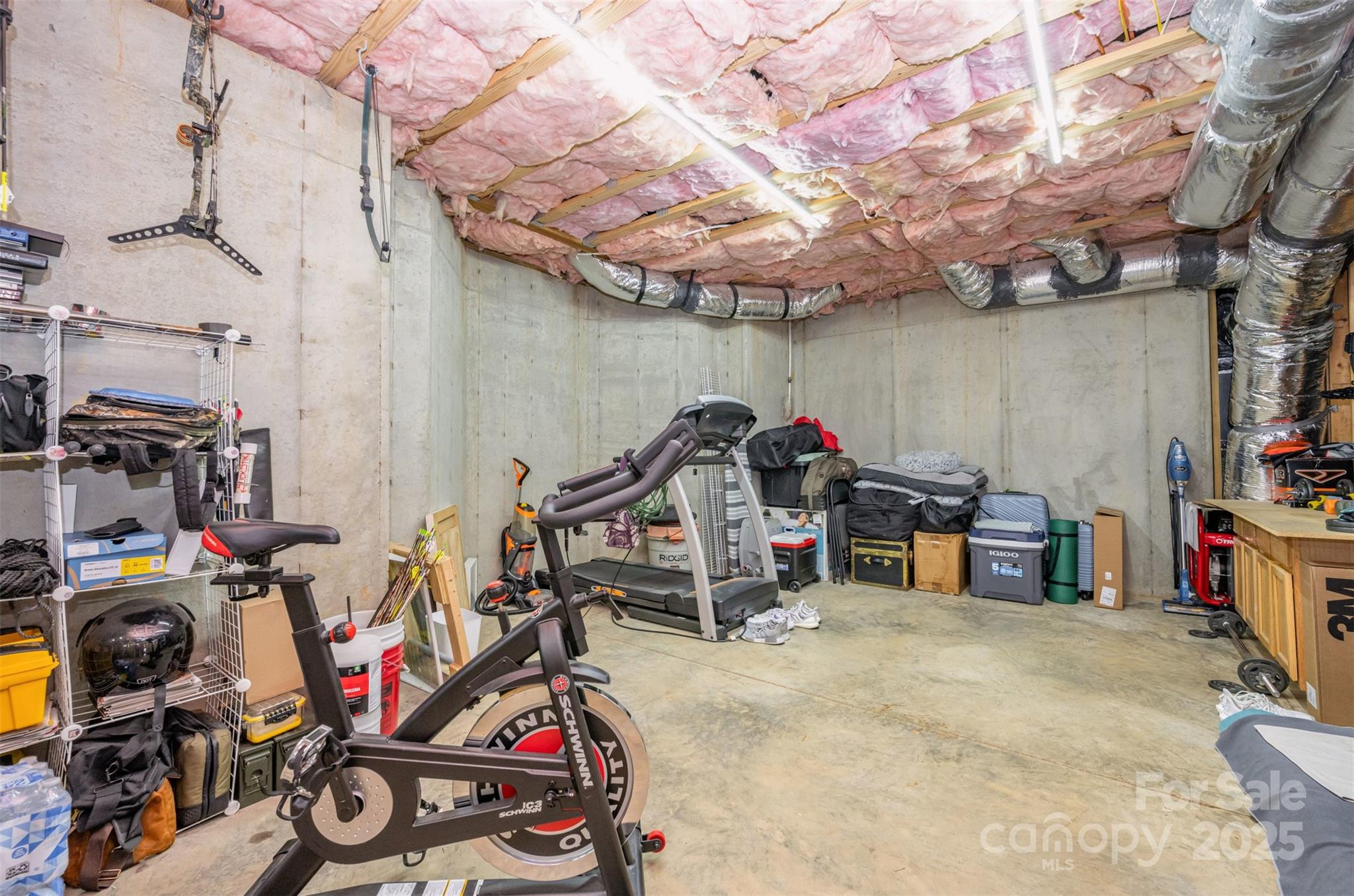 9467 Hester Court Harrisburg, NC 28075 - Photo 36 of 48 a view of a storage room with a lot of stuff