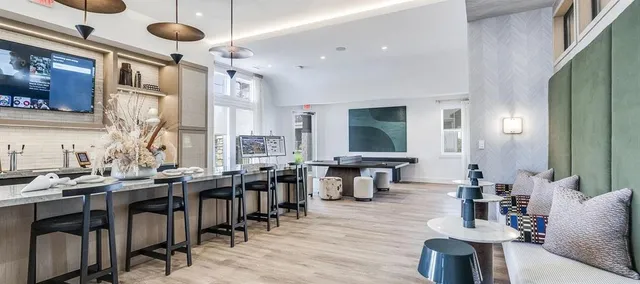 a view of a dining area with furniture window and wooden floor