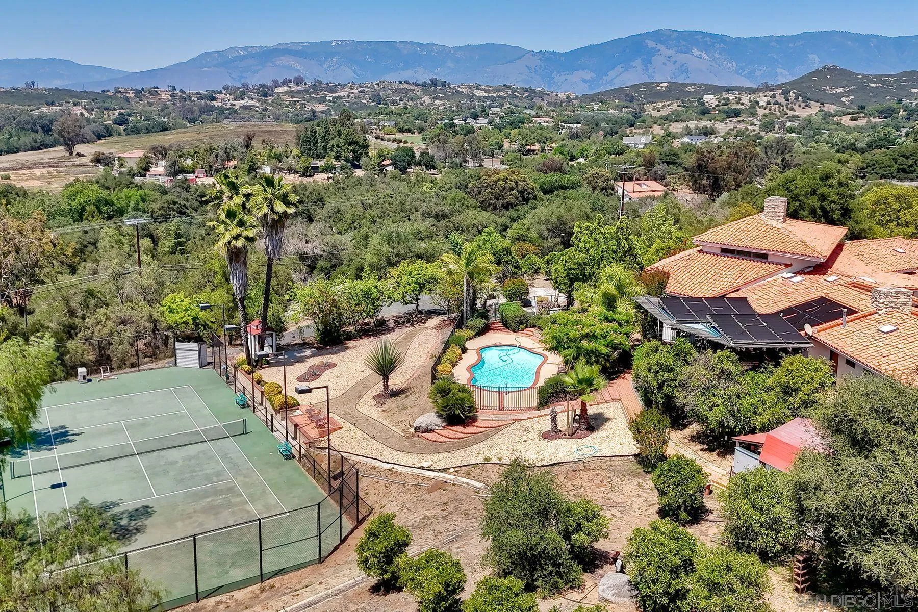 30458 Cool Valley Highlands Road Valley Center, CA 92082 - Photo 47 of 47 an aerial view of a house with a garden