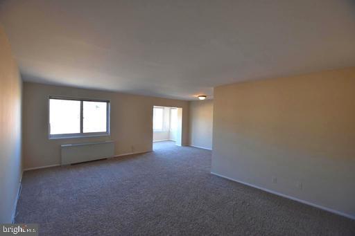 4313 Knox Road, Unit 501 College Park, MD 20740 - Photo 2 of 17 an empty room with windows