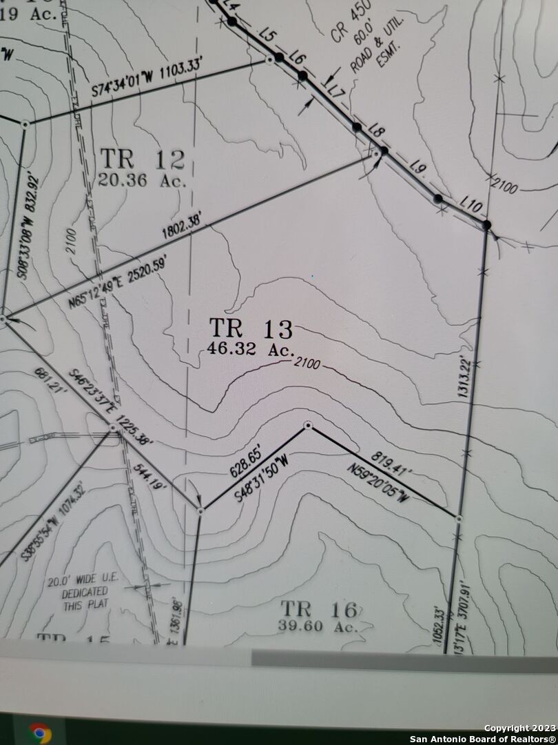 7687 County Road 450 Rocksprings, TX 78880 - Photo 12 of 17 a black and white photo of a book