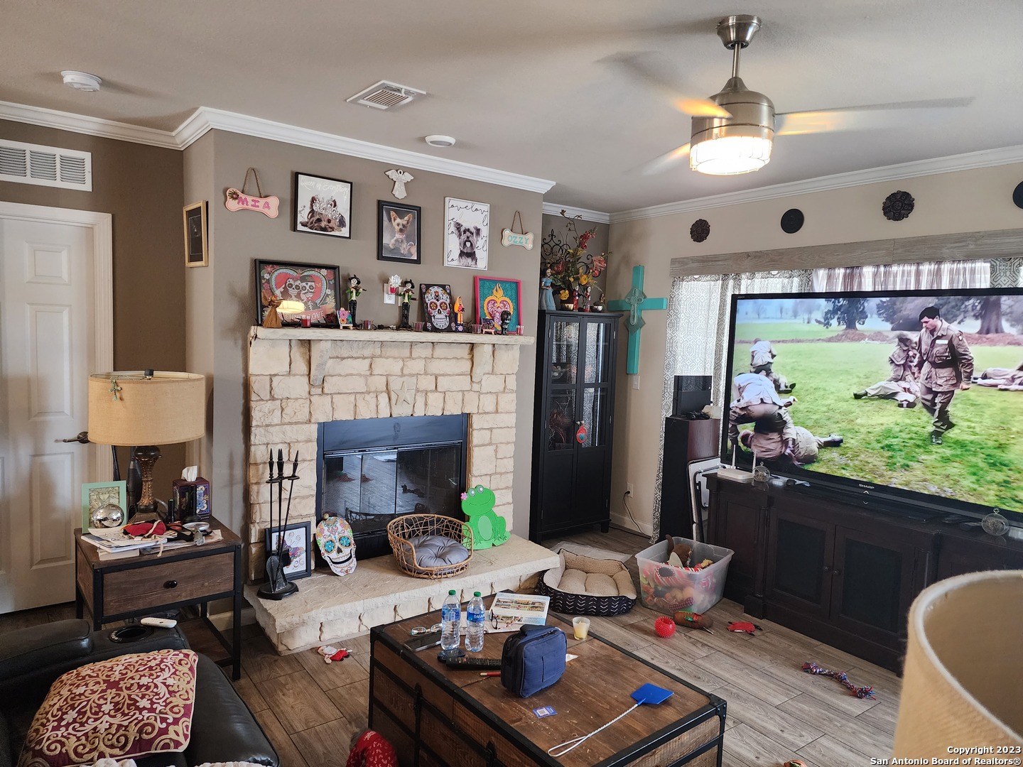 7687 County Road 450 Rocksprings, TX 78880 - Photo 7 of 17 a living room with furniture and a fireplace
