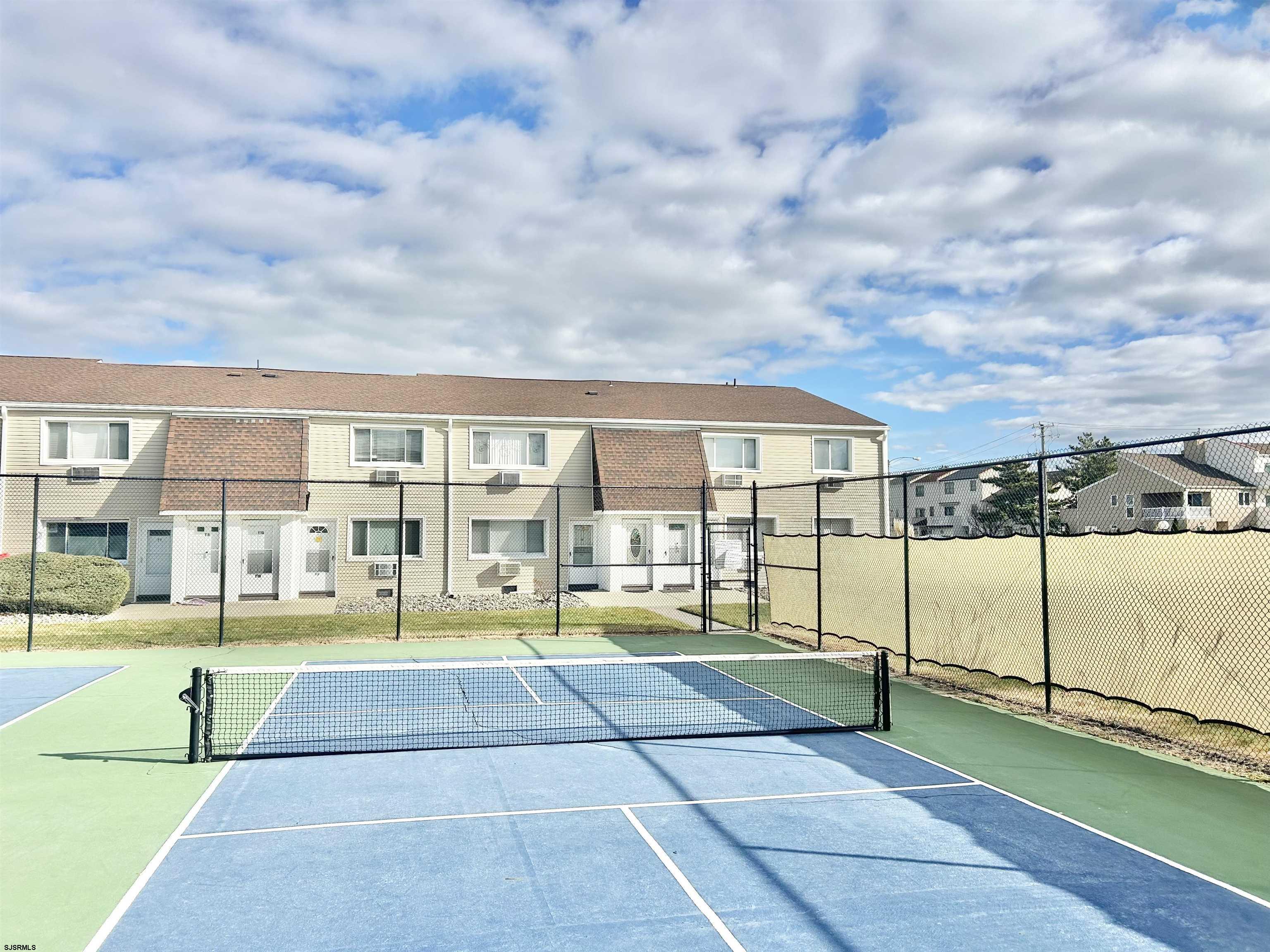 4901 Harbor Beach Boulevard, Unit N10 Brigantine, NJ 08203 - Photo 14 of 17 a view of yard with an outdoor seating