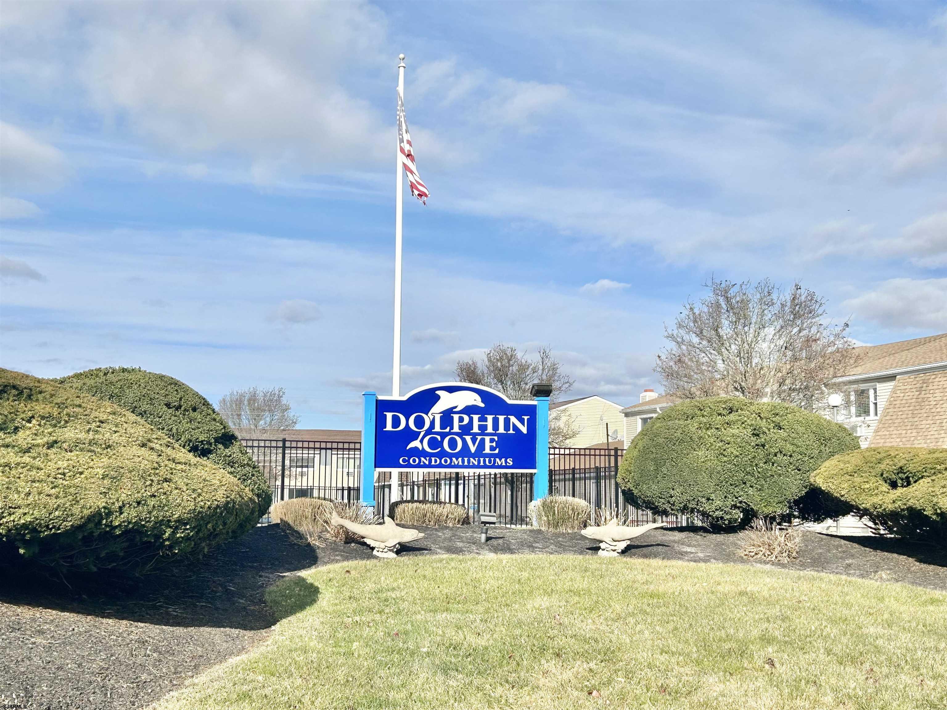 4901 Harbor Beach Boulevard, Unit N10 Brigantine, NJ 08203 - Photo 16 of 17 a sign on the side of a road