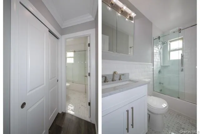 a bathroom with a granite countertop sink a toilet and shower
