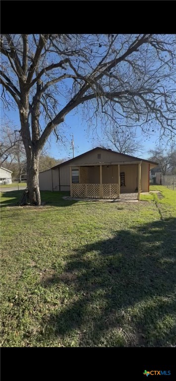 924 Pecan Street Seguin, TX 78155 - Photo 8 of 8 a view of a house with a yard