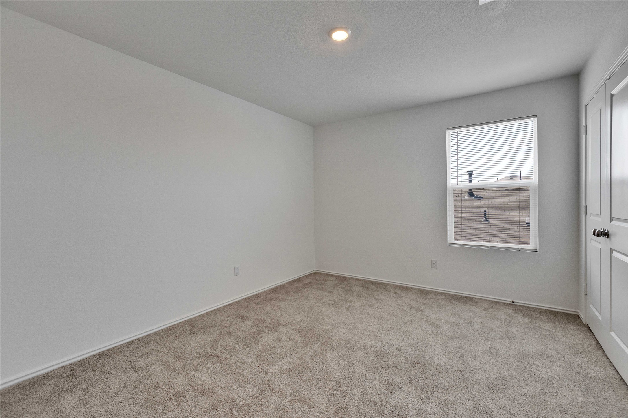 206 Canley Loop Hutto, TX 78634 - Photo 23 of 31 Upstairs bedroom with a walk in closet.