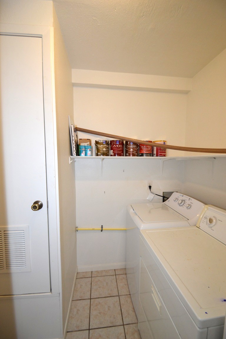 1211 Ridgemont Drive Austin, TX 78723 - Photo 22 of 28 a utility room with dryer and washer