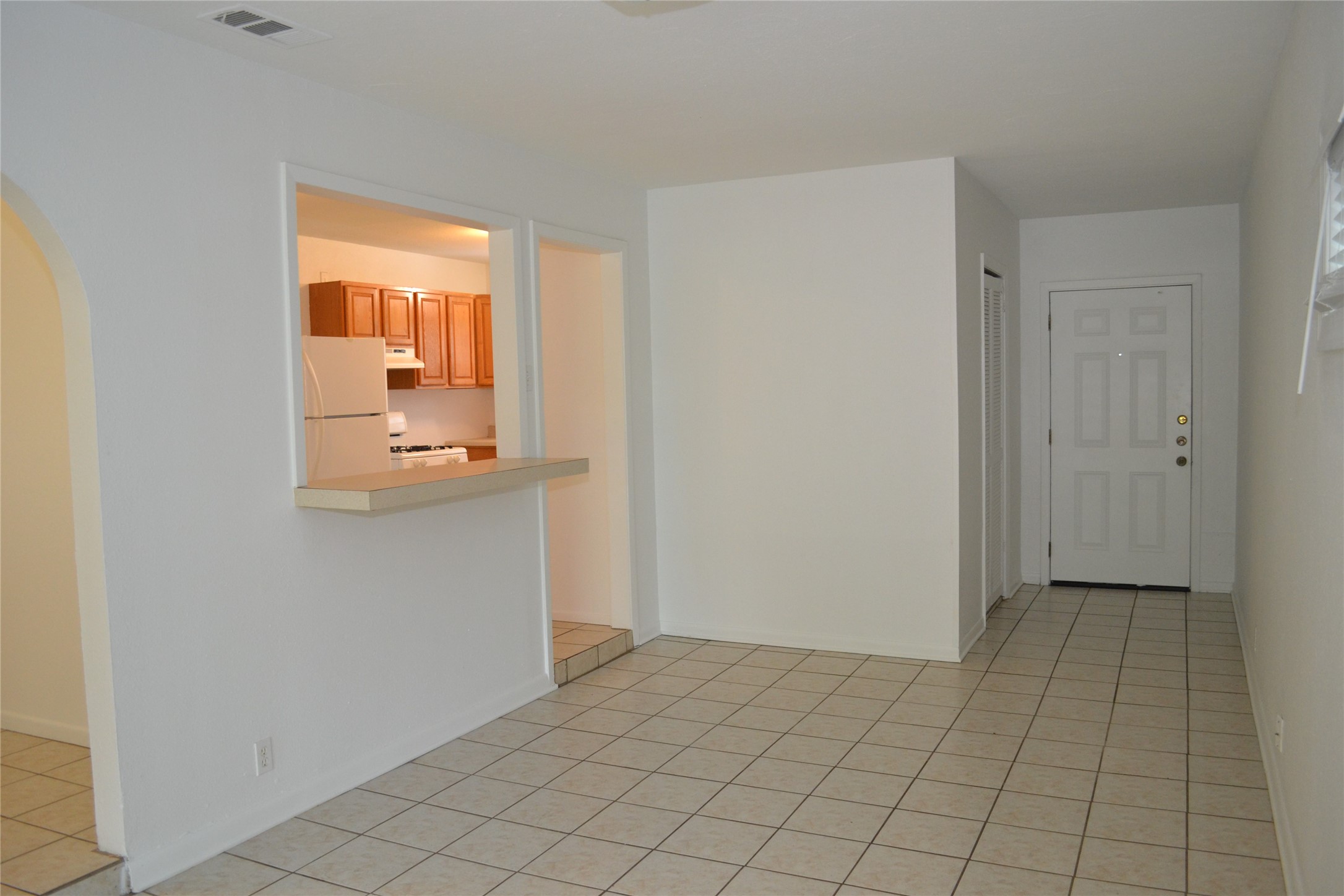 1211 Ridgemont Drive Austin, TX 78723 - Photo 7 of 28 a view of an empty room and wooden floor