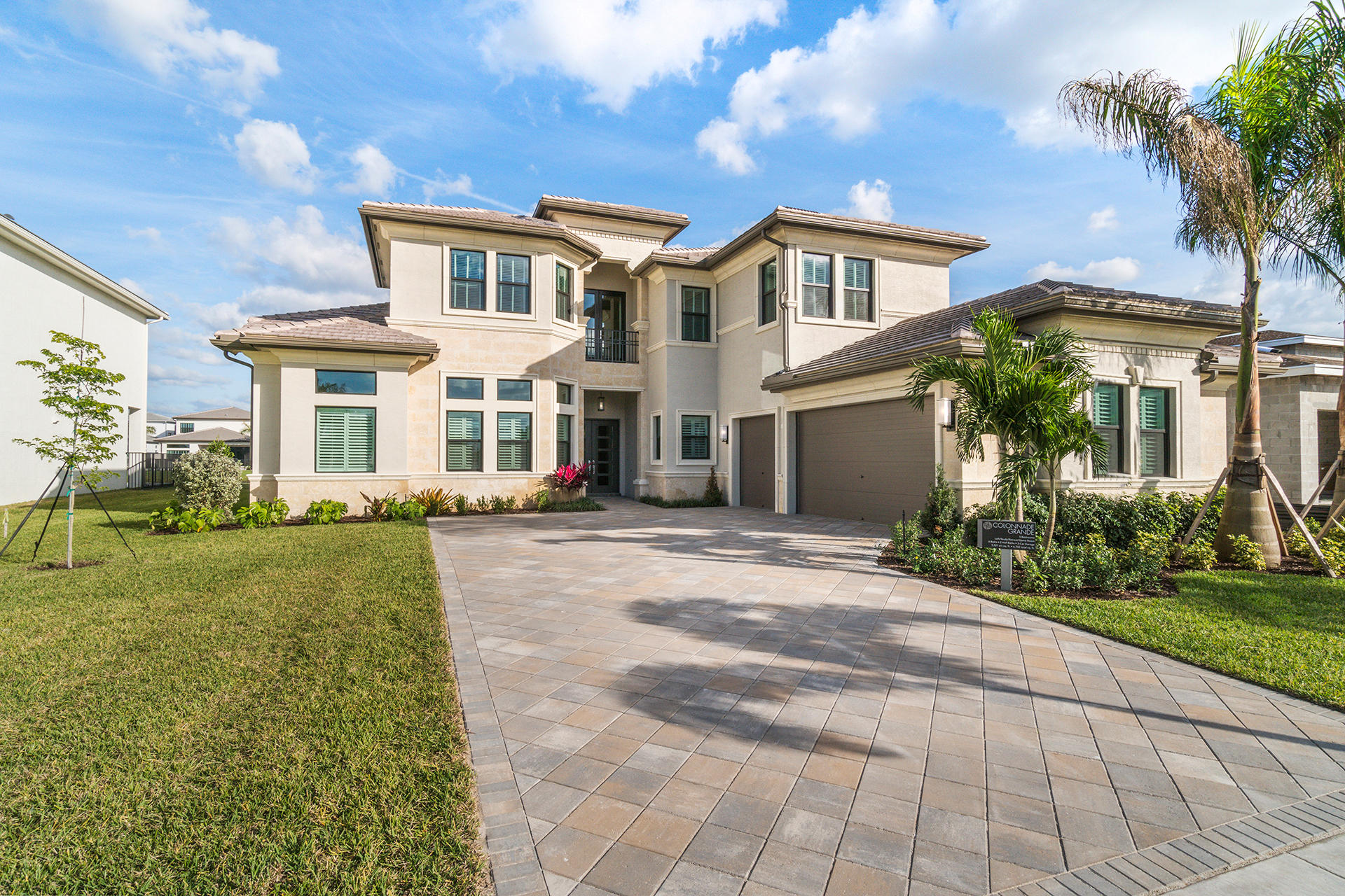 17334 Rosella Road Boca Raton, FL 33496 - Photo 1 of 50 a front view of a house with a yard and garage