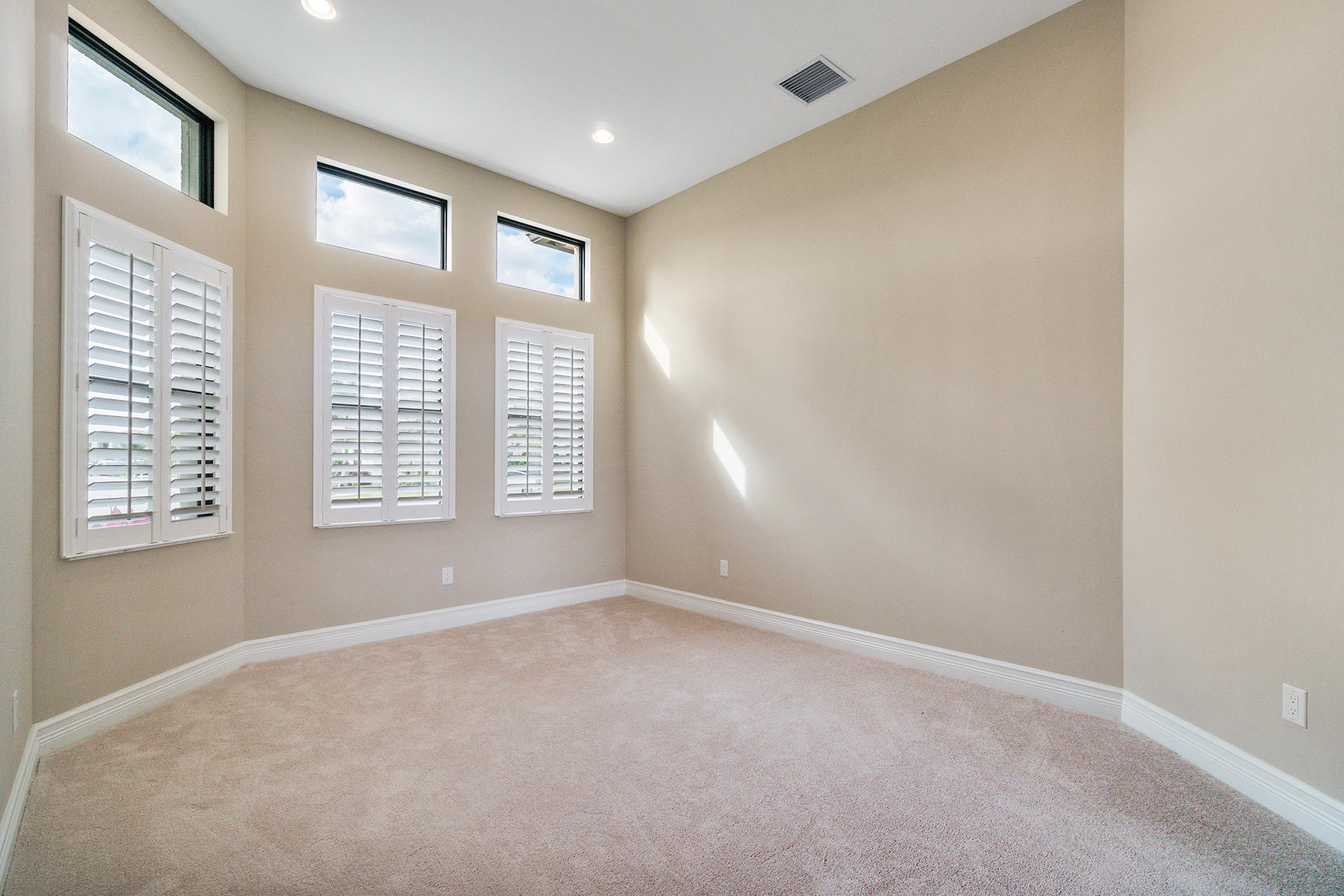 17334 Rosella Road Boca Raton, FL 33496 - Photo 14 of 50 a view of an empty room with a window