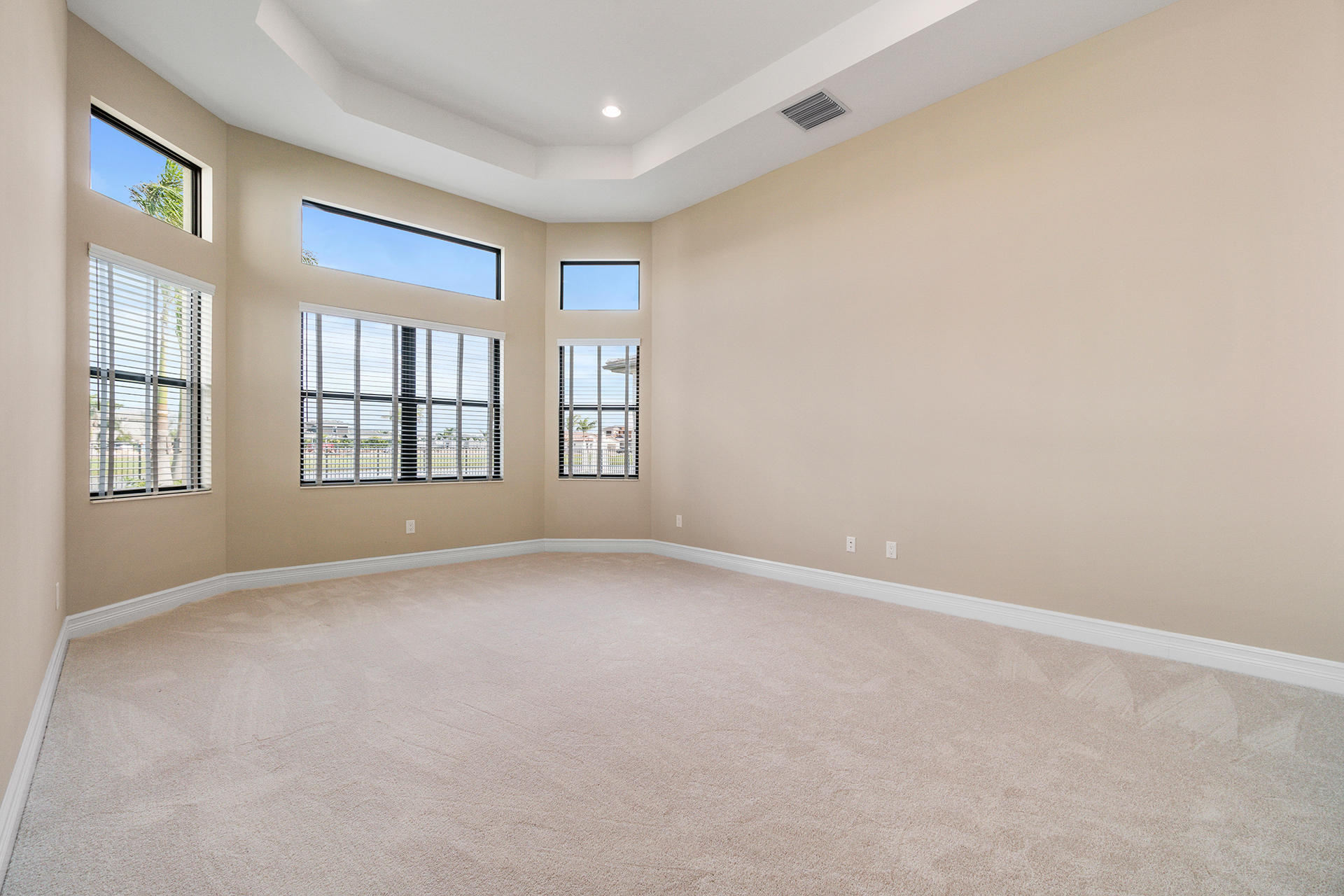 17334 Rosella Road Boca Raton, FL 33496 - Photo 15 of 50 an empty room with windows