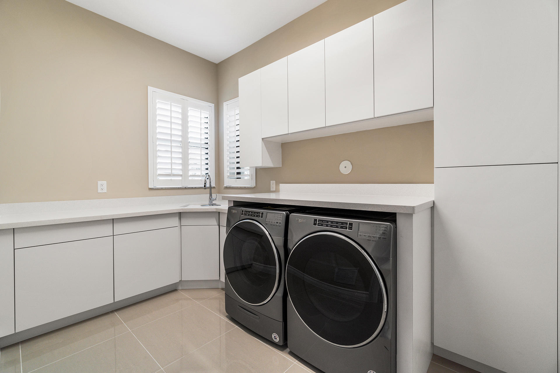 17334 Rosella Road Boca Raton, FL 33496 - Photo 22 of 50 a utility room with dryer and washer