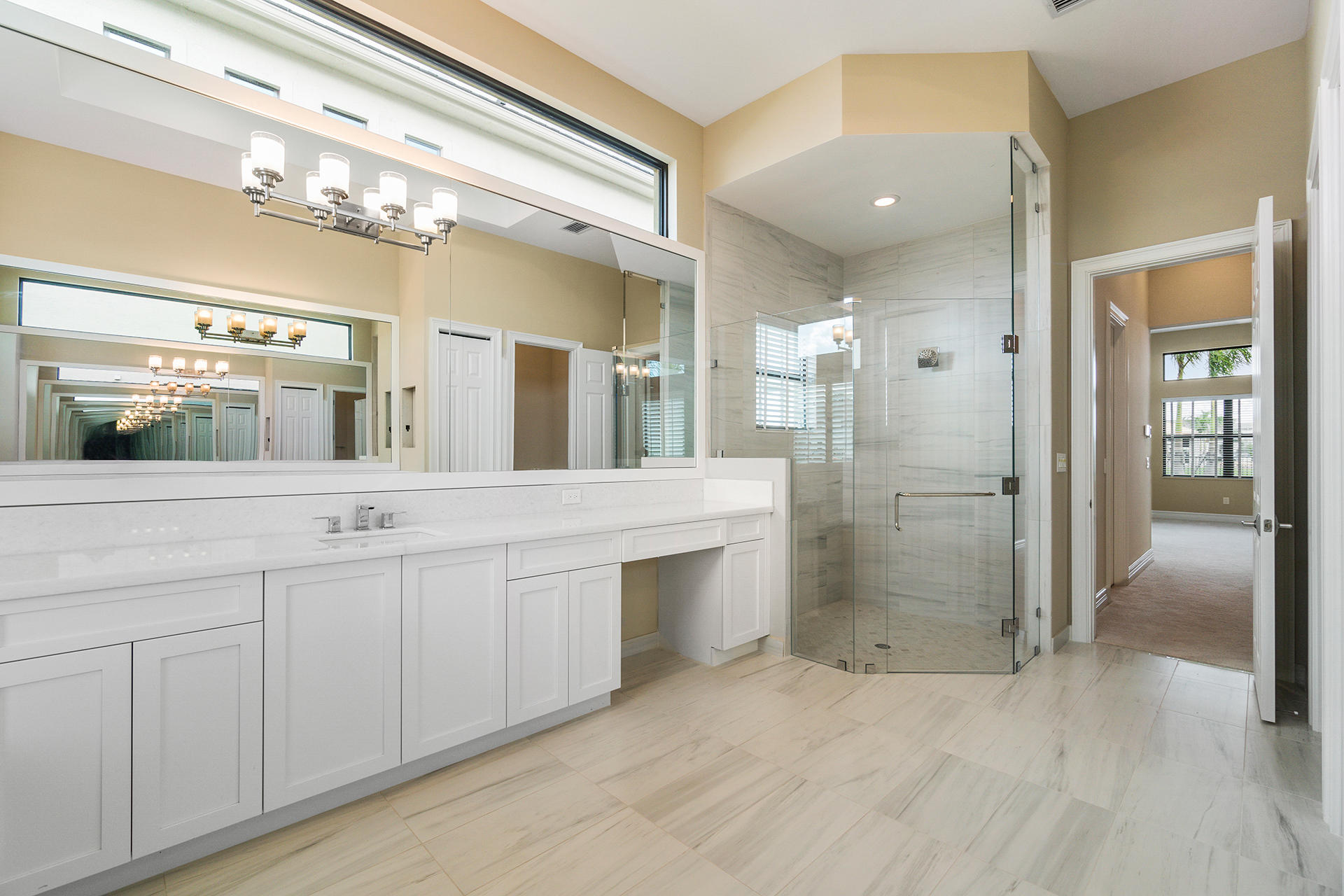 17334 Rosella Road Boca Raton, FL 33496 - Photo 26 of 50 a bathroom with a double vanity sink mirror and shower