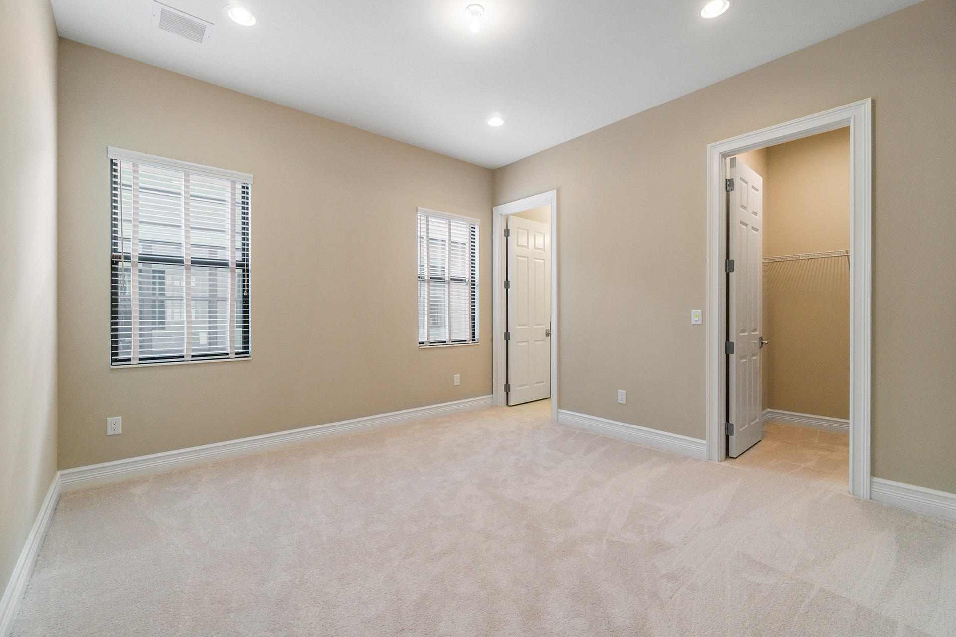 17334 Rosella Road Boca Raton, FL 33496 - Photo 27 of 50 an empty room with windows and closet