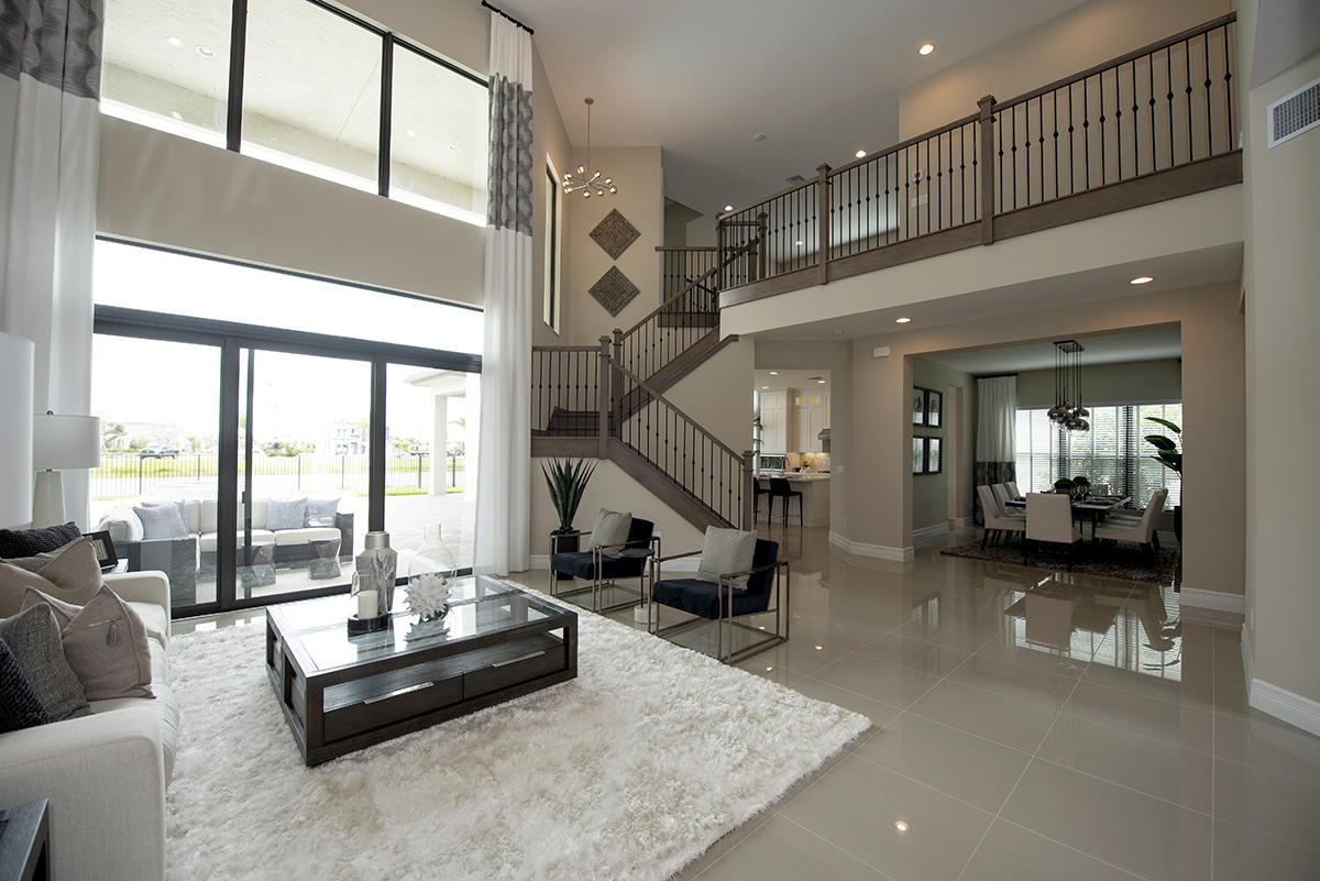 17334 Rosella Road Boca Raton, FL 33496 - Photo 3 of 50 a living room with furniture and large windows
