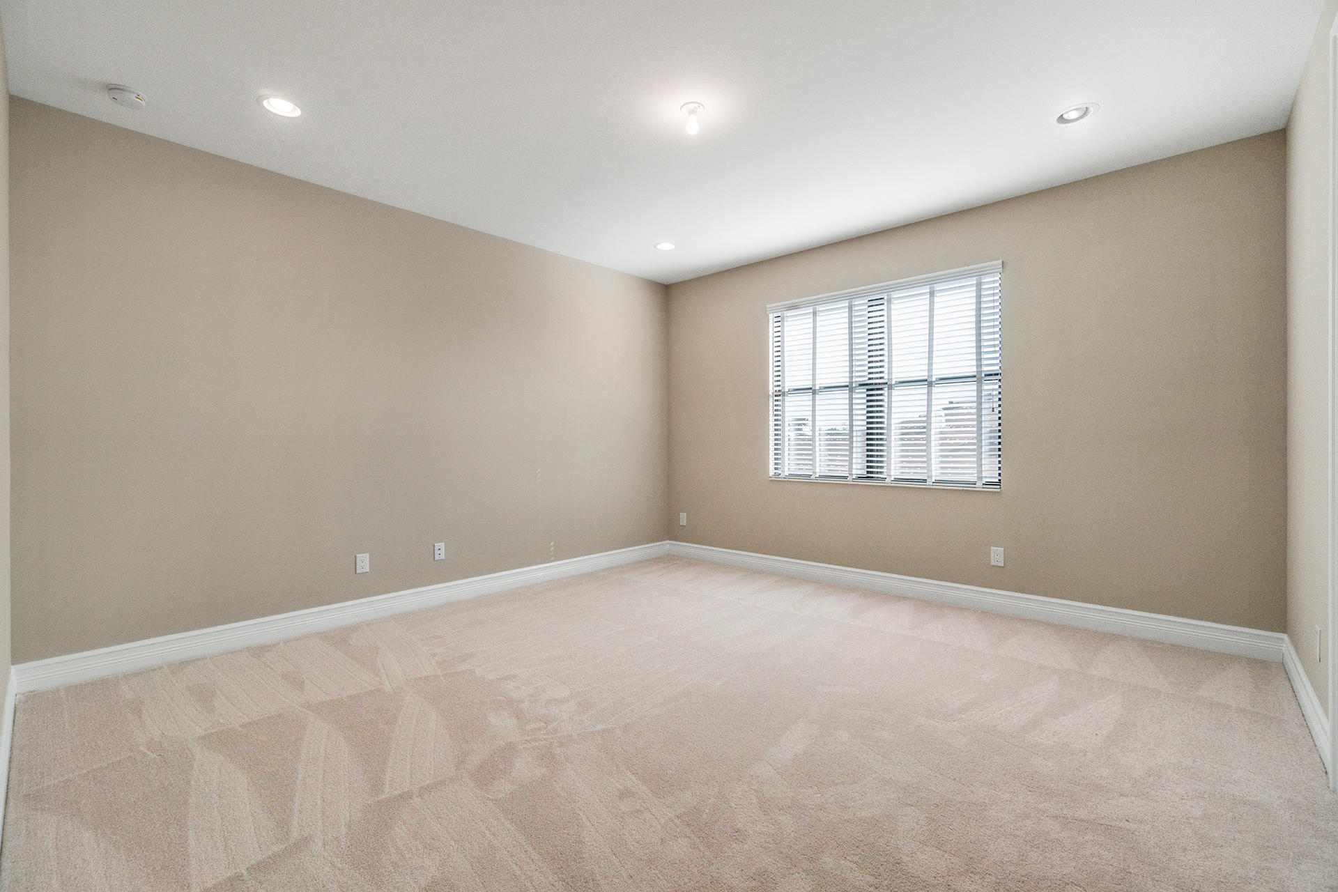 17334 Rosella Road Boca Raton, FL 33496 - Photo 31 of 50 an empty room with windows