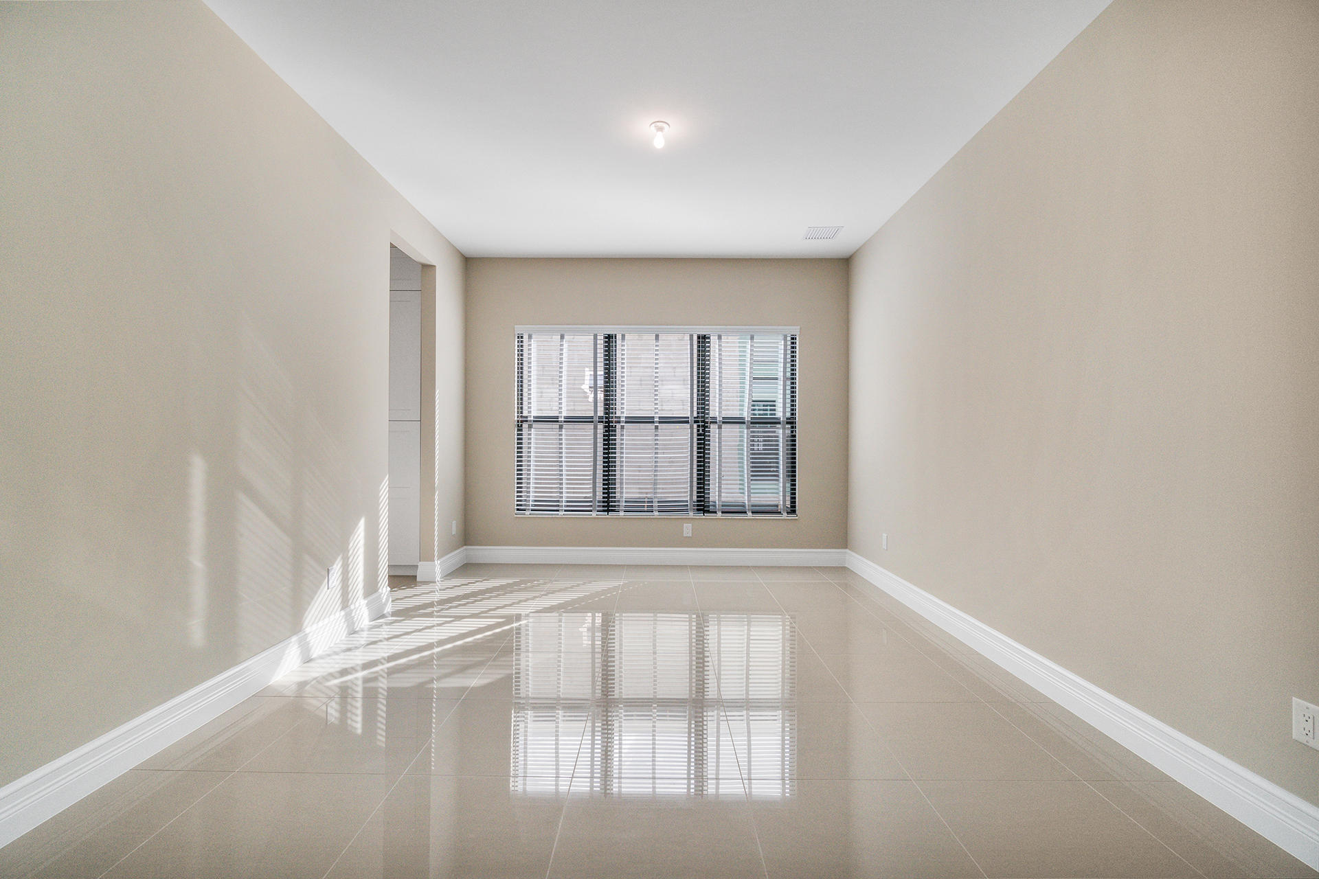 17334 Rosella Road Boca Raton, FL 33496 - Photo 34 of 50 an empty room with a window