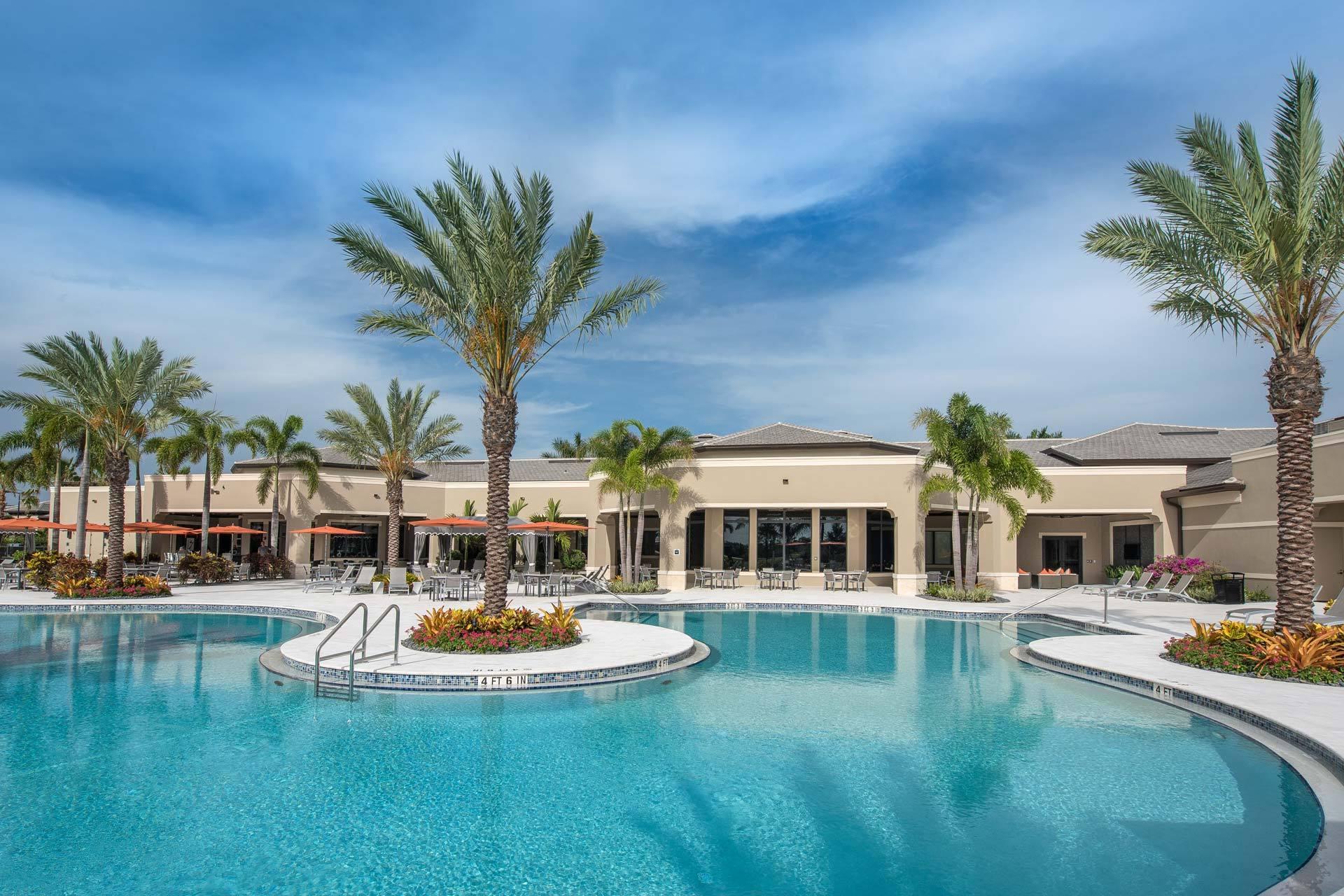 17334 Rosella Road Boca Raton, FL 33496 - Photo 47 of 50 a view of a swimming pool with a garden and plants