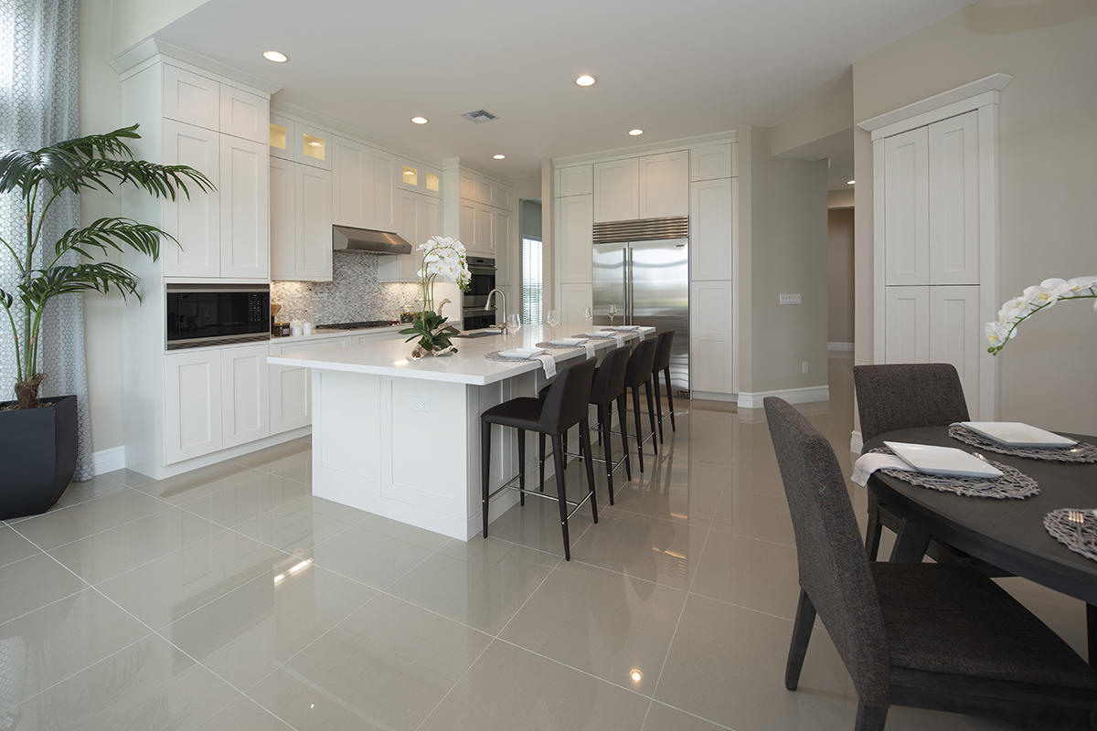 17334 Rosella Road Boca Raton, FL 33496 - Photo 6 of 50 a kitchen with a table and chairs