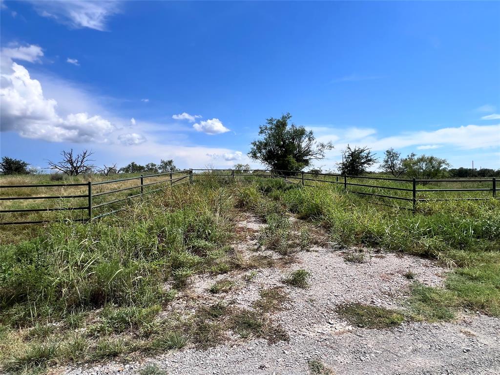 0 Turtle Hole Road Graham, TX 76450 - Photo 10 of 21 a view of a lake with a house in the background