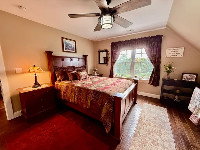 a bed room with a bed and a couch