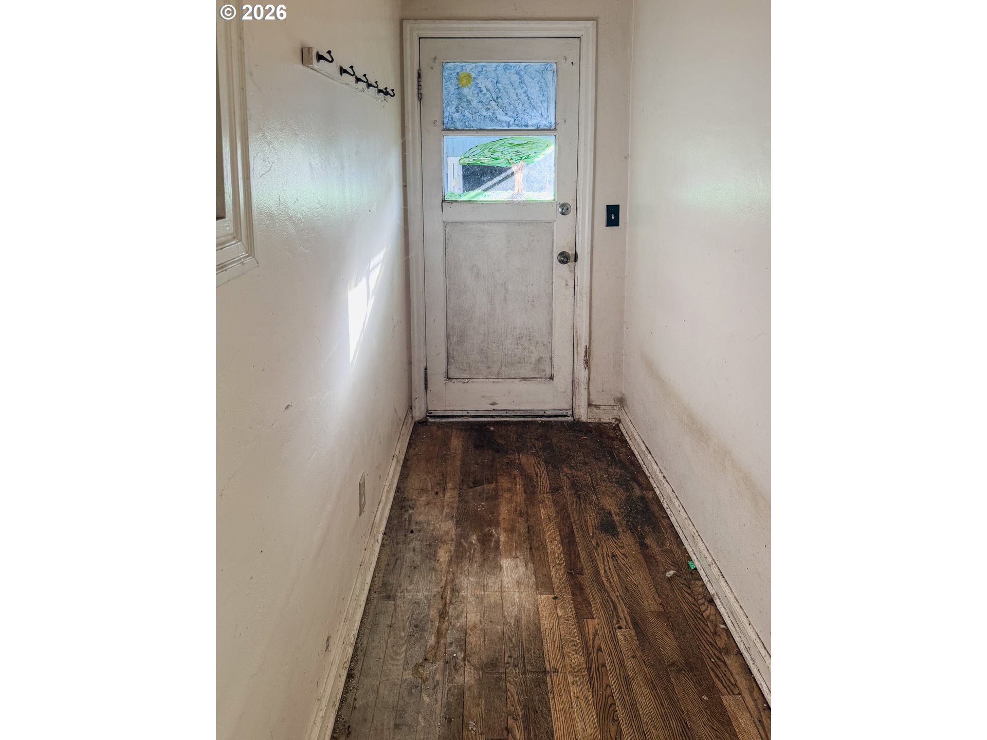 5995 Main Street Springfield, OR 97478 - Photo 8 of 18 a view of a hallway with wooden floor