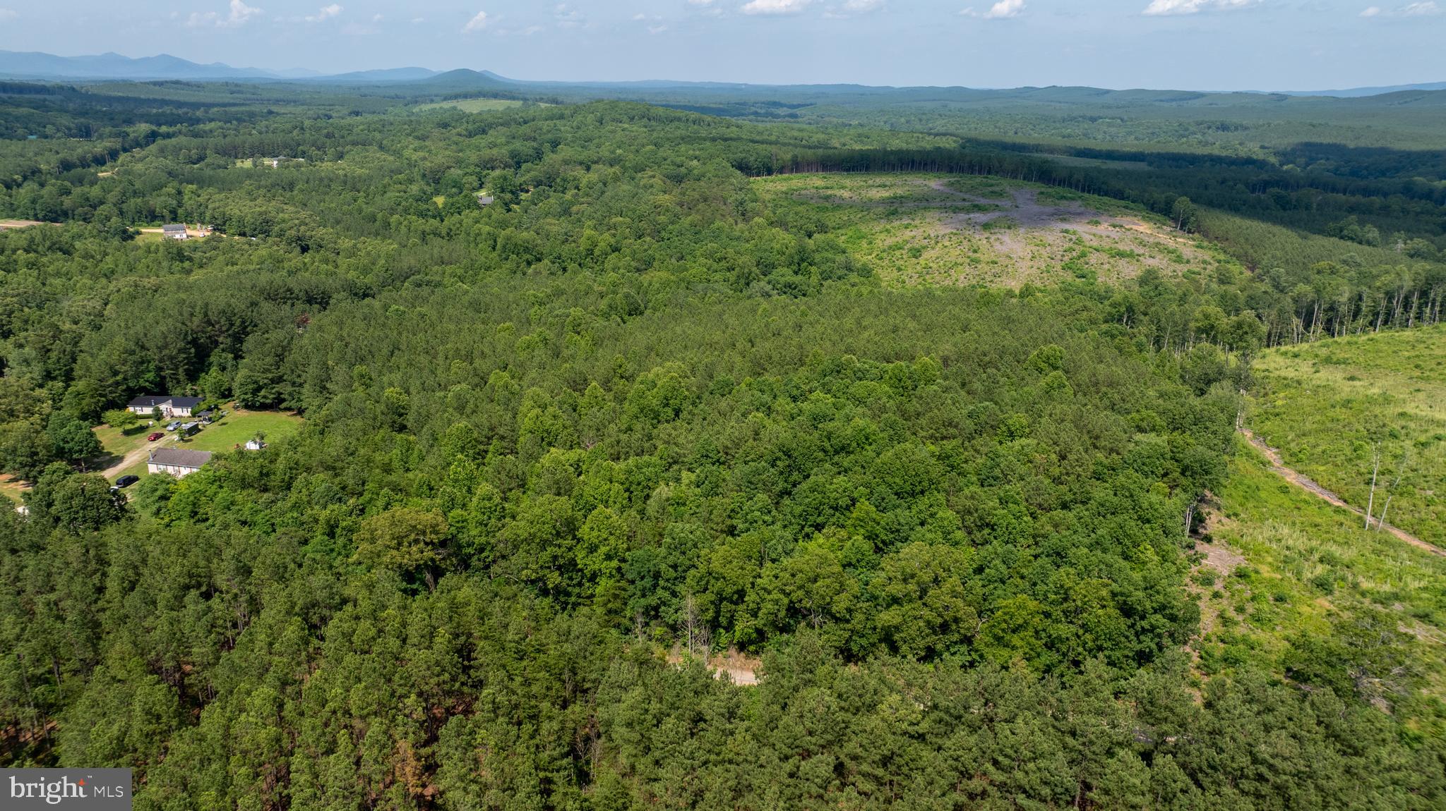 Tbd Springfield Road, Unit 1 Meherrin, VA 23954 - Photo 4 of 19 a view of a lake with a field