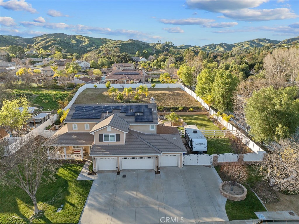 30177 Sagecrest Way Castaic, CA 91384 - Photo 1 of 54 an aerial view of residential houses with outdoor space