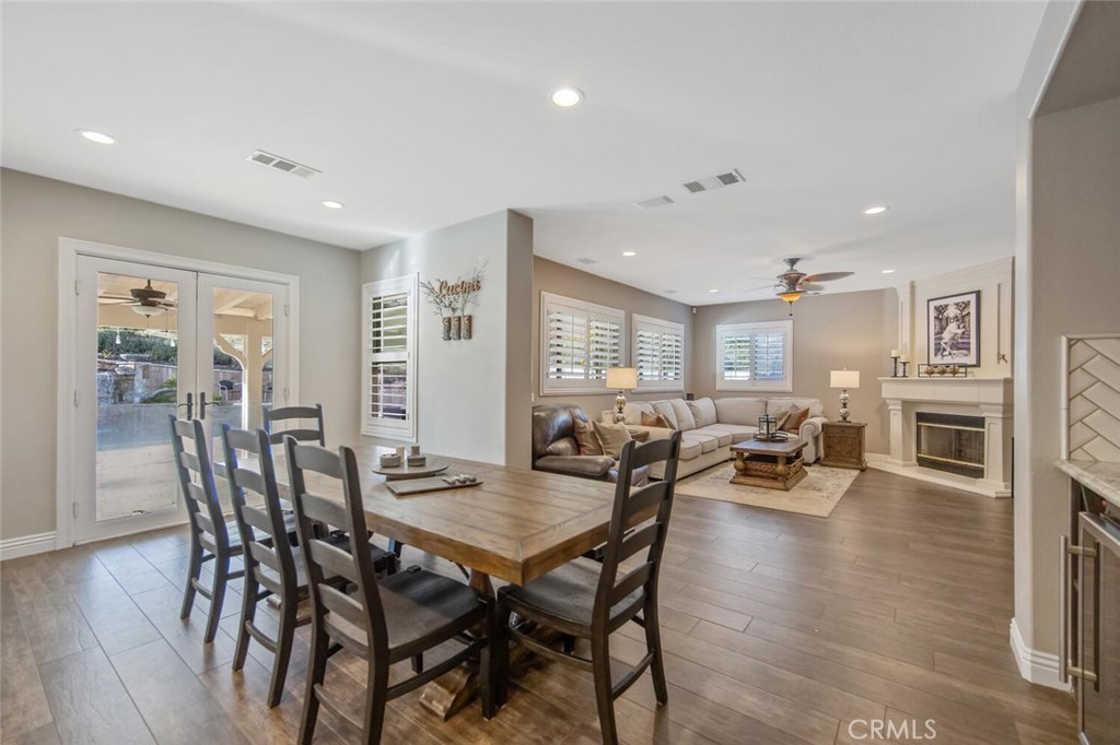 30177 Sagecrest Way Castaic, CA 91384 - Photo 16 of 54 a view of a dining room with furniture and wooden floor