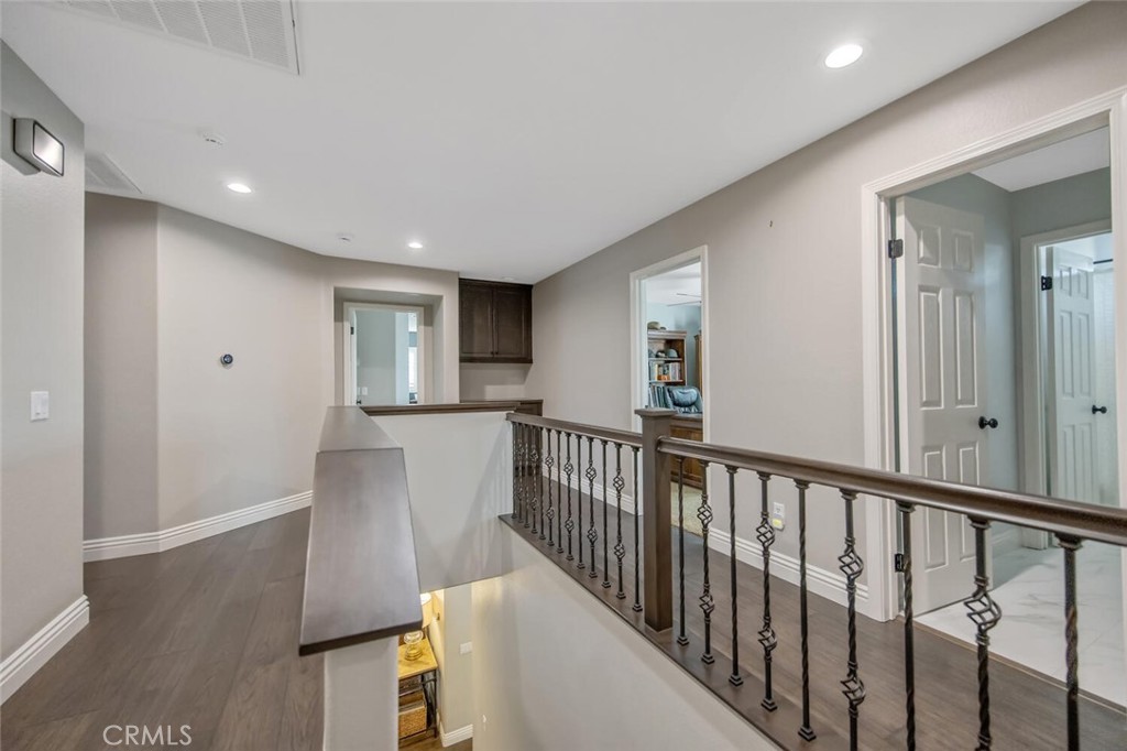 30177 Sagecrest Way Castaic, CA 91384 - Photo 24 of 54 a view of hallway with wooden floor