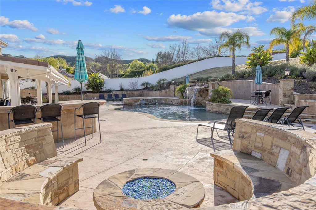 30177 Sagecrest Way Castaic, CA 91384 - Photo 40 of 54 a view of a patio with couches table and chairs